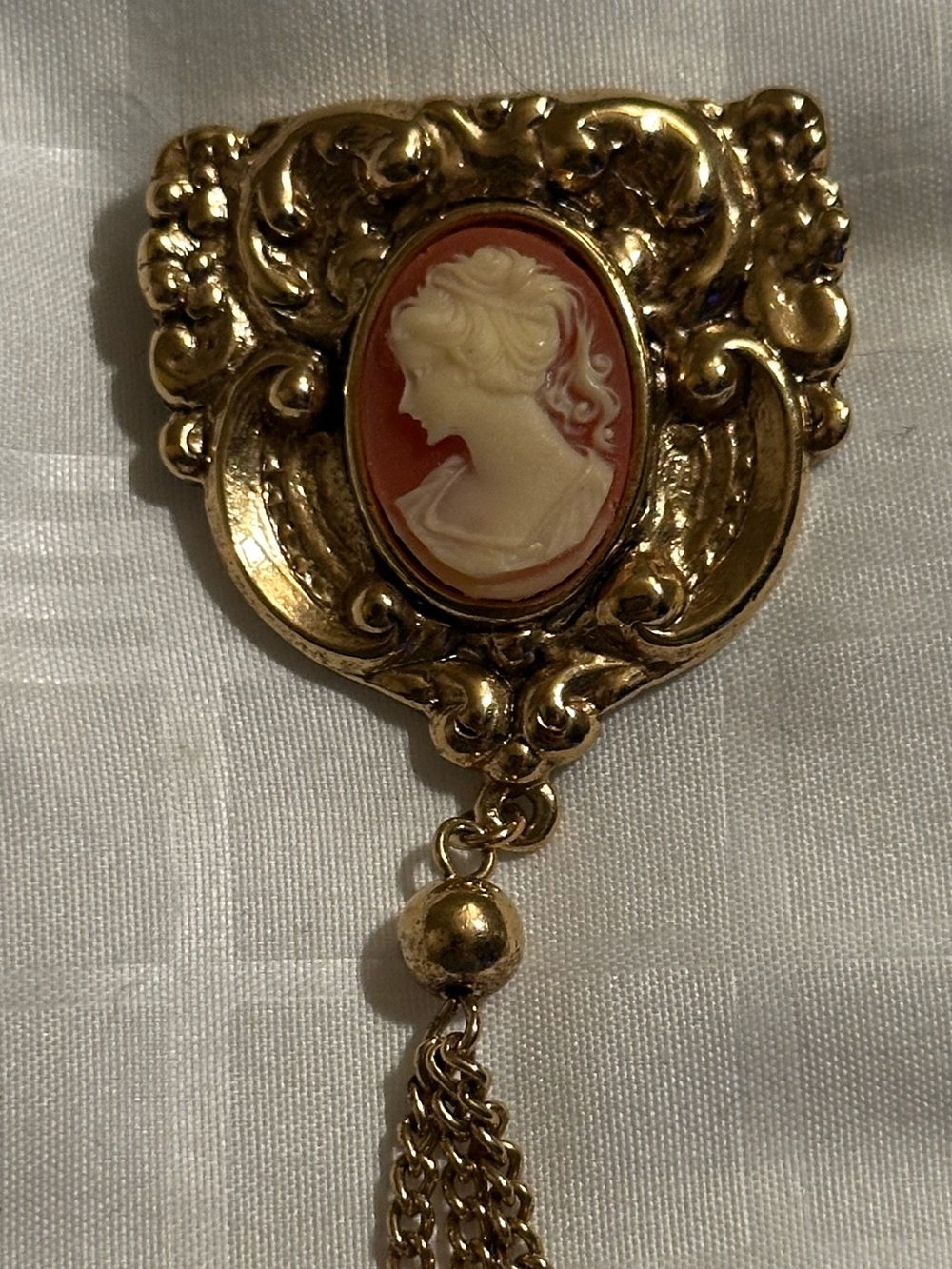 Vintage inspired gold-tone & resin cameo brooch / lapel pin with metal tassel